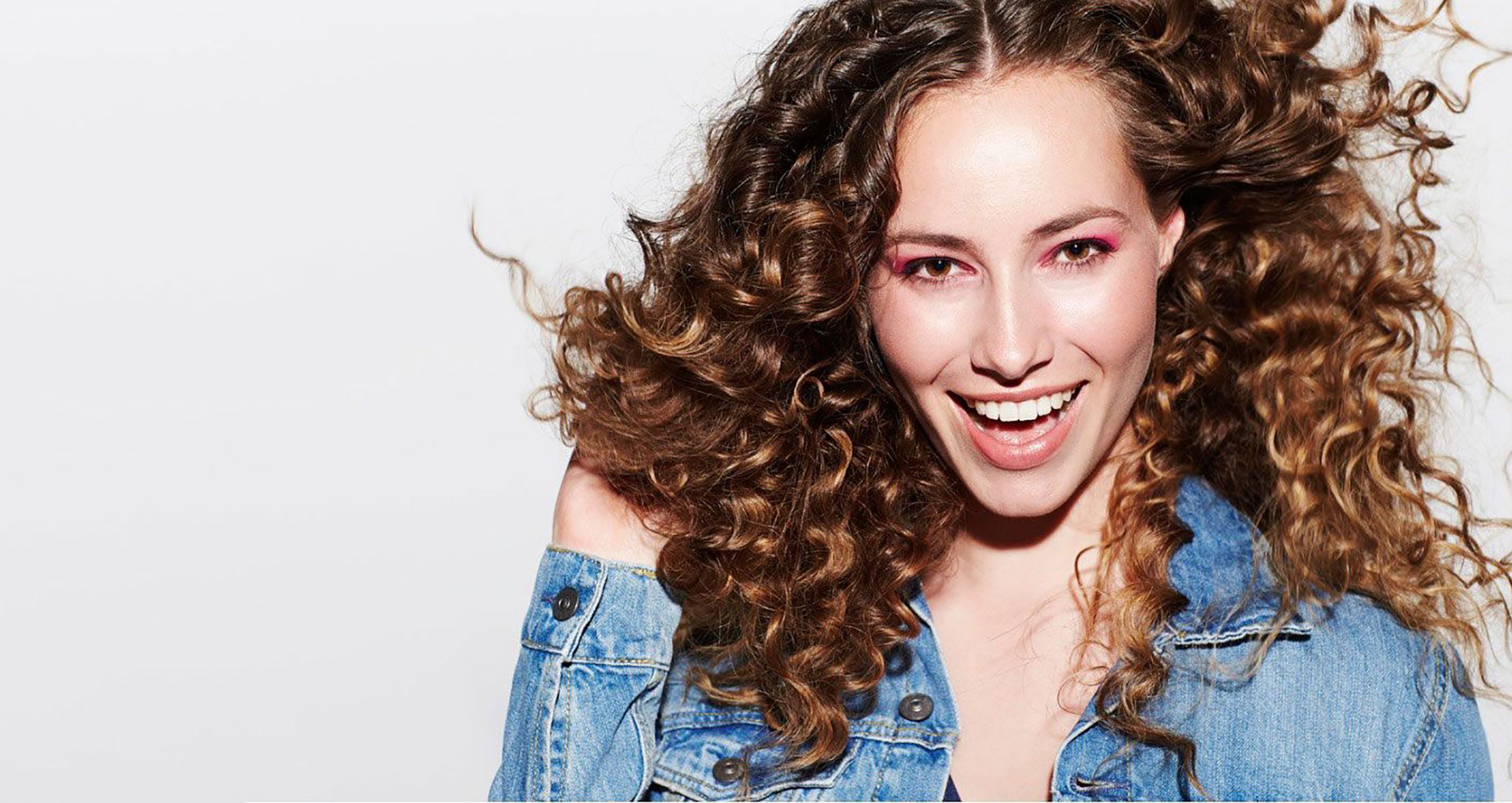 happy girl after using conditioner for frizzy hair